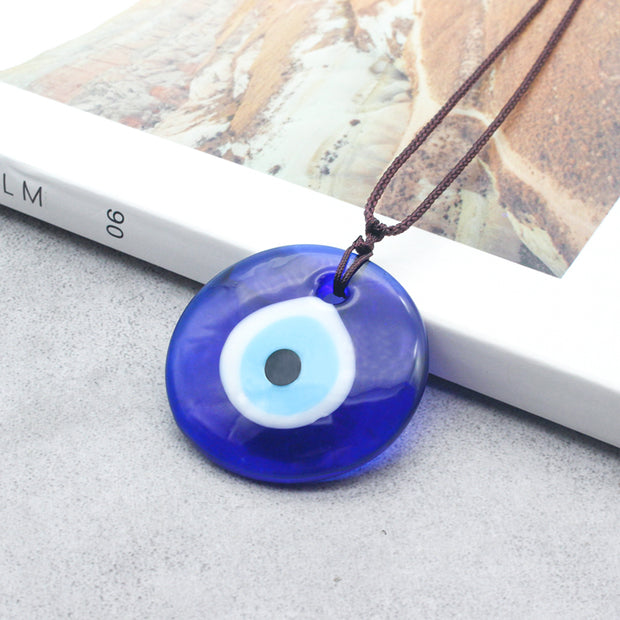Blue eye glass pendant